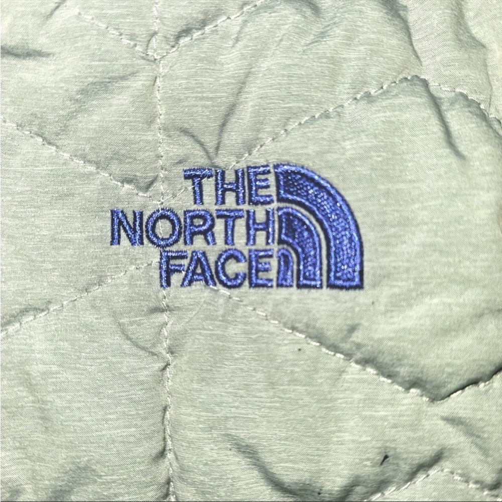 The North Face quilted gray/blue quilted jacket